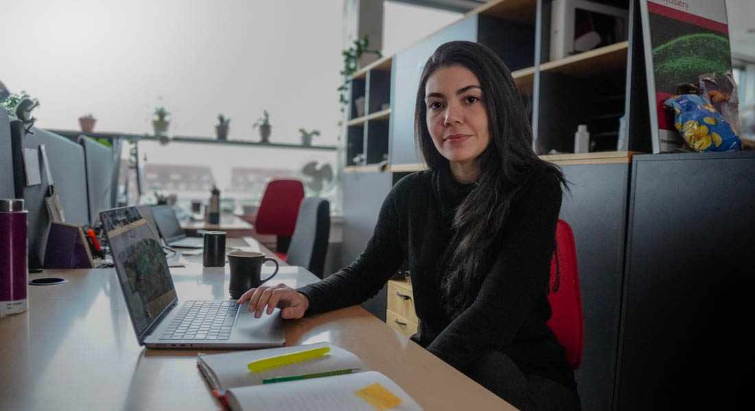 Nathalia Cardozo Da Conceicao at her desk