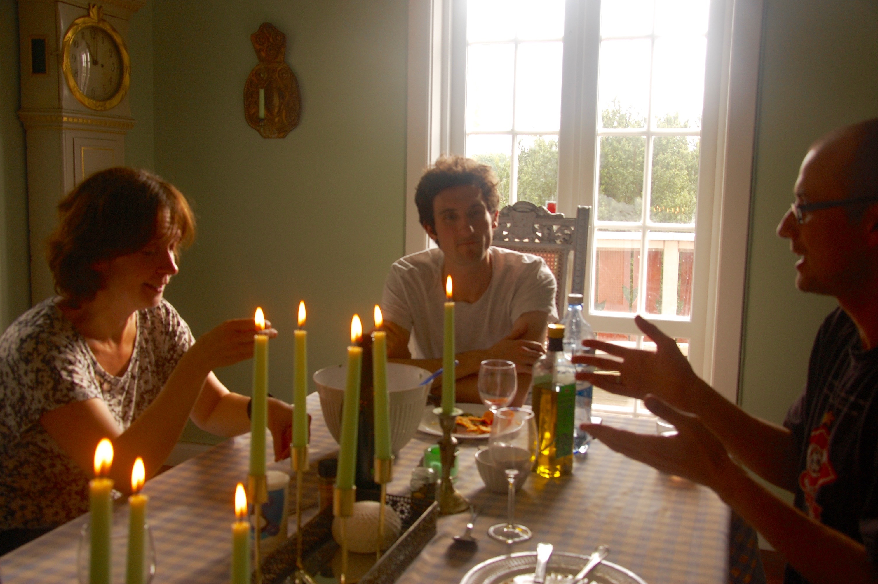 Image 5. Having a dinner. Irina, Sam and  Kostya