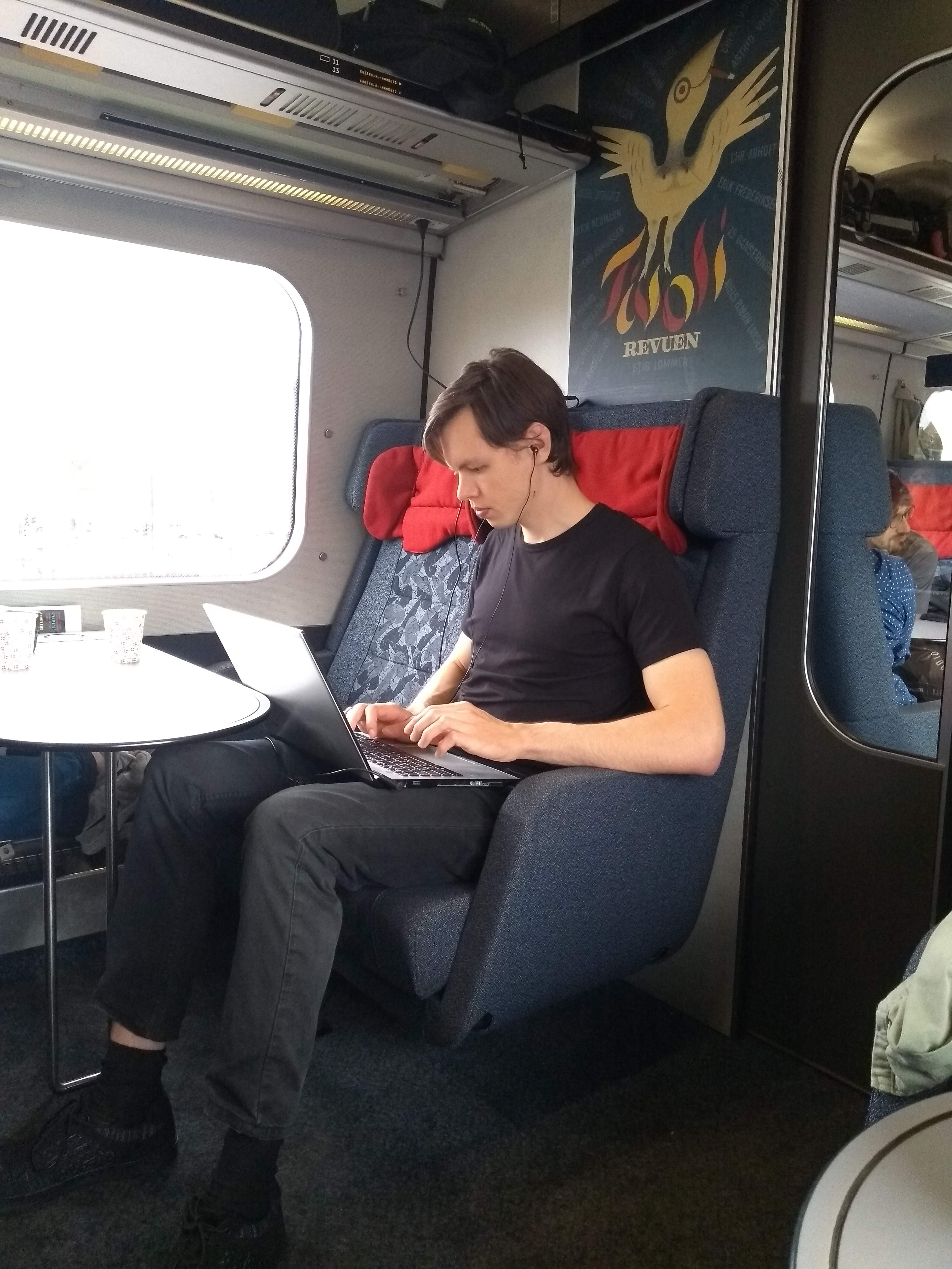Image 19. Viktor is able to work anywhere at any circumstances.  Here   he is in train on the way to Hamburg.
