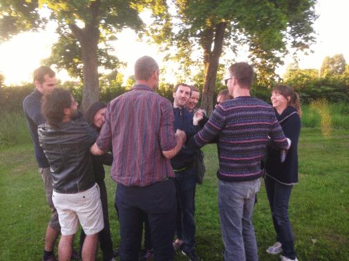 Researchers doing team building outside