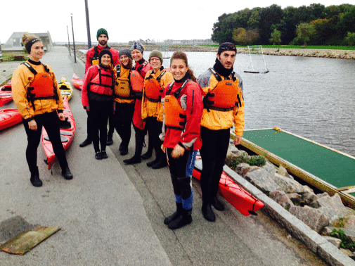 Lund group wearing life jacket before canooing