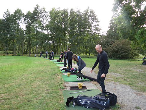 People playing golf